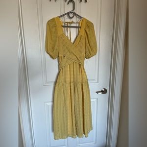 Lulu’s yellow puff sleeve wrap-front midi dress
